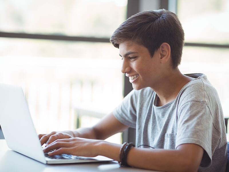 Boy using a laptop