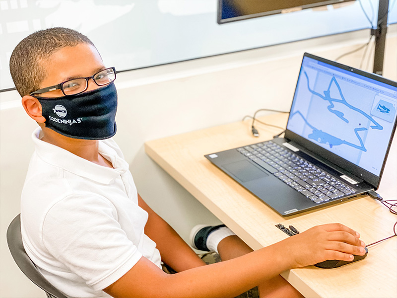 Boy using laptop